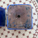 Set of two hanging pots in blue glazed ceramic.