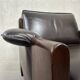 Vintage Leolux brown leather/oak lounge chair and ottoman by Harry de Groot – 1970