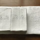 Tablecloth and 12 linen towels marked AA