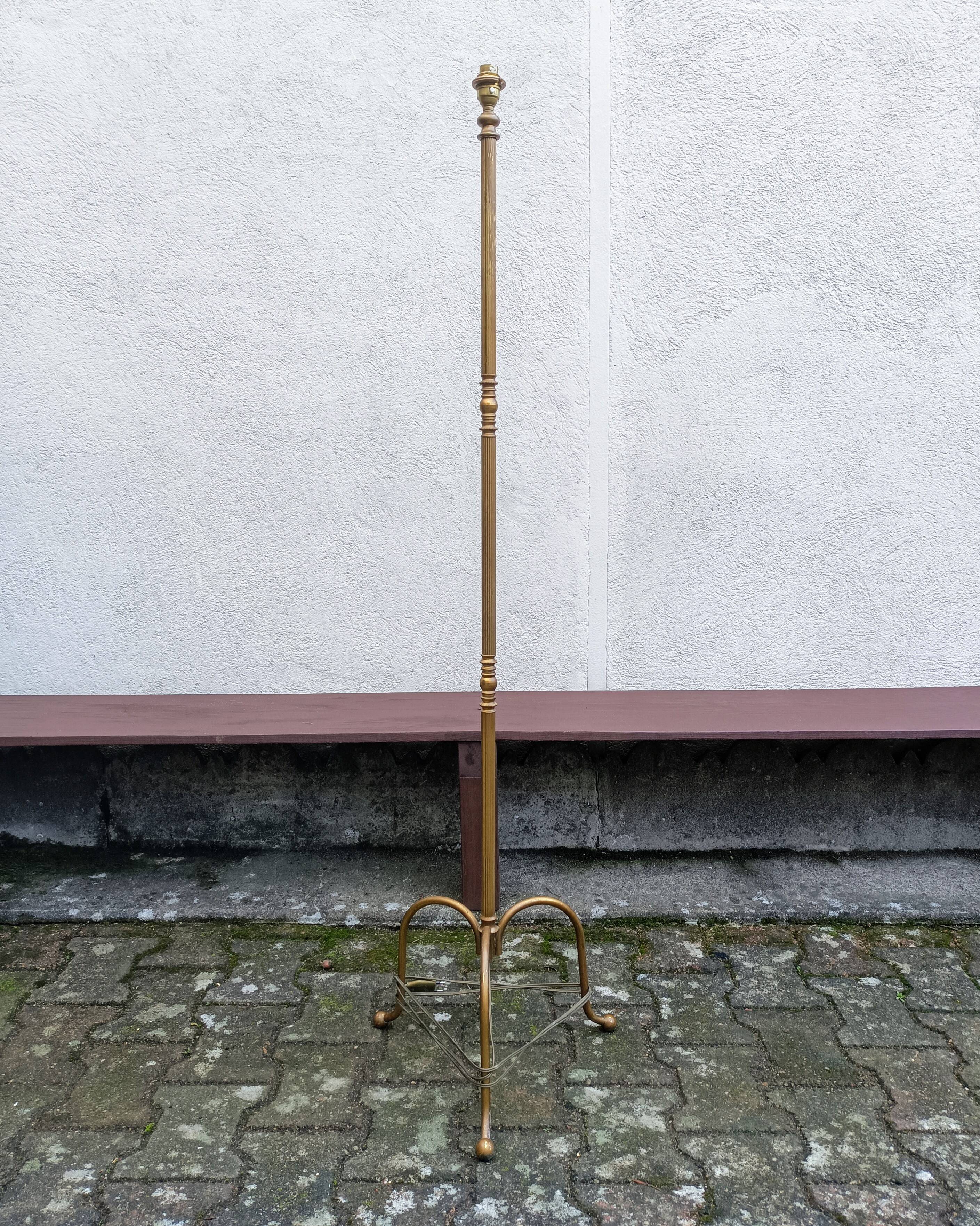 Brass tripod floor lamp