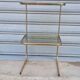 End table in gold metal and smoked glass