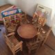 Toy countryside dining room made of straw and wood