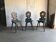 Set of 3 vintage wooden accent chairs painted navy blue, with 1920s decorated backs.