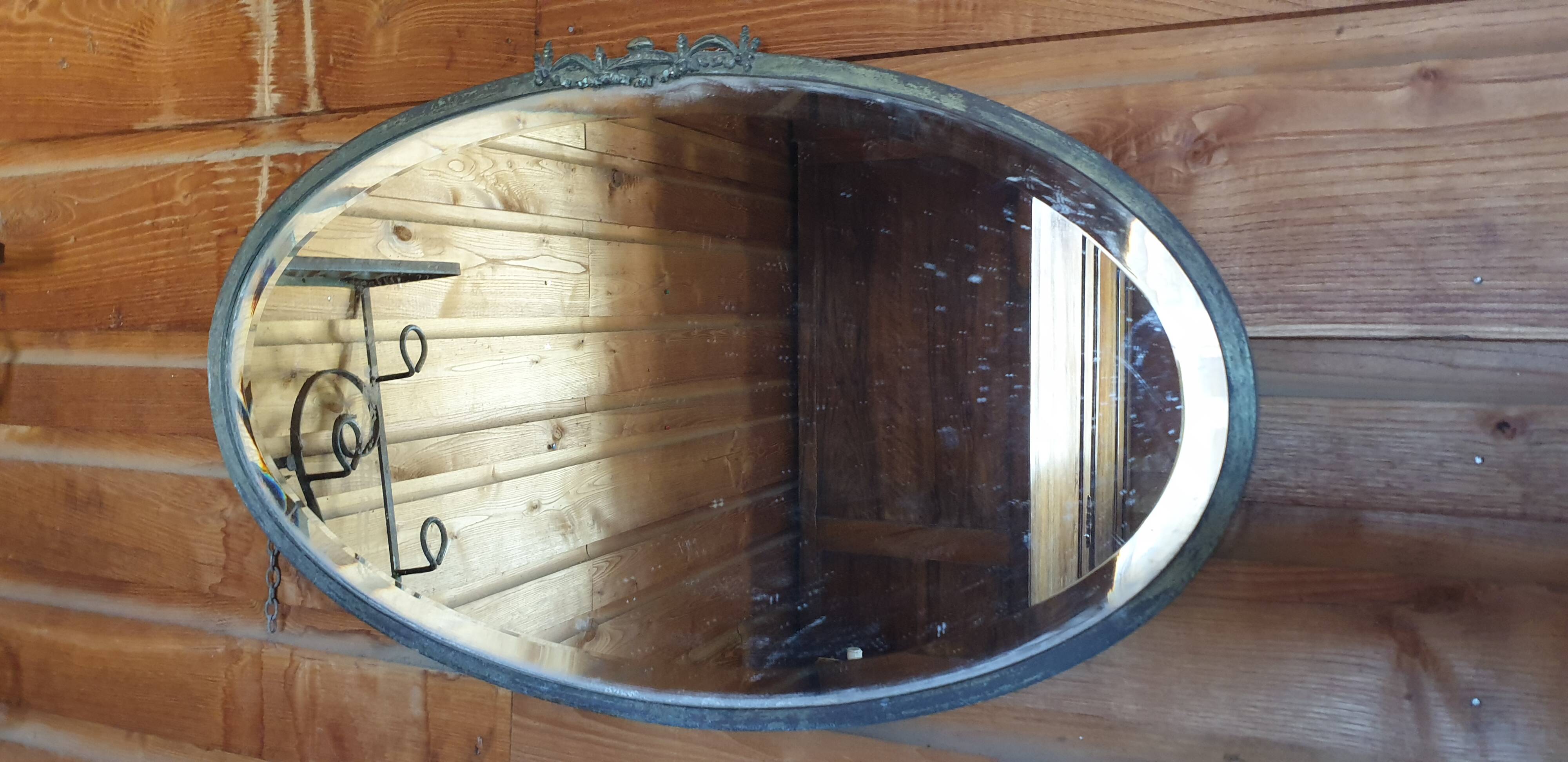 Oval beveled mirror with bronze frame - 19th century