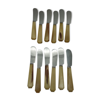 Twelve vintage butter knives