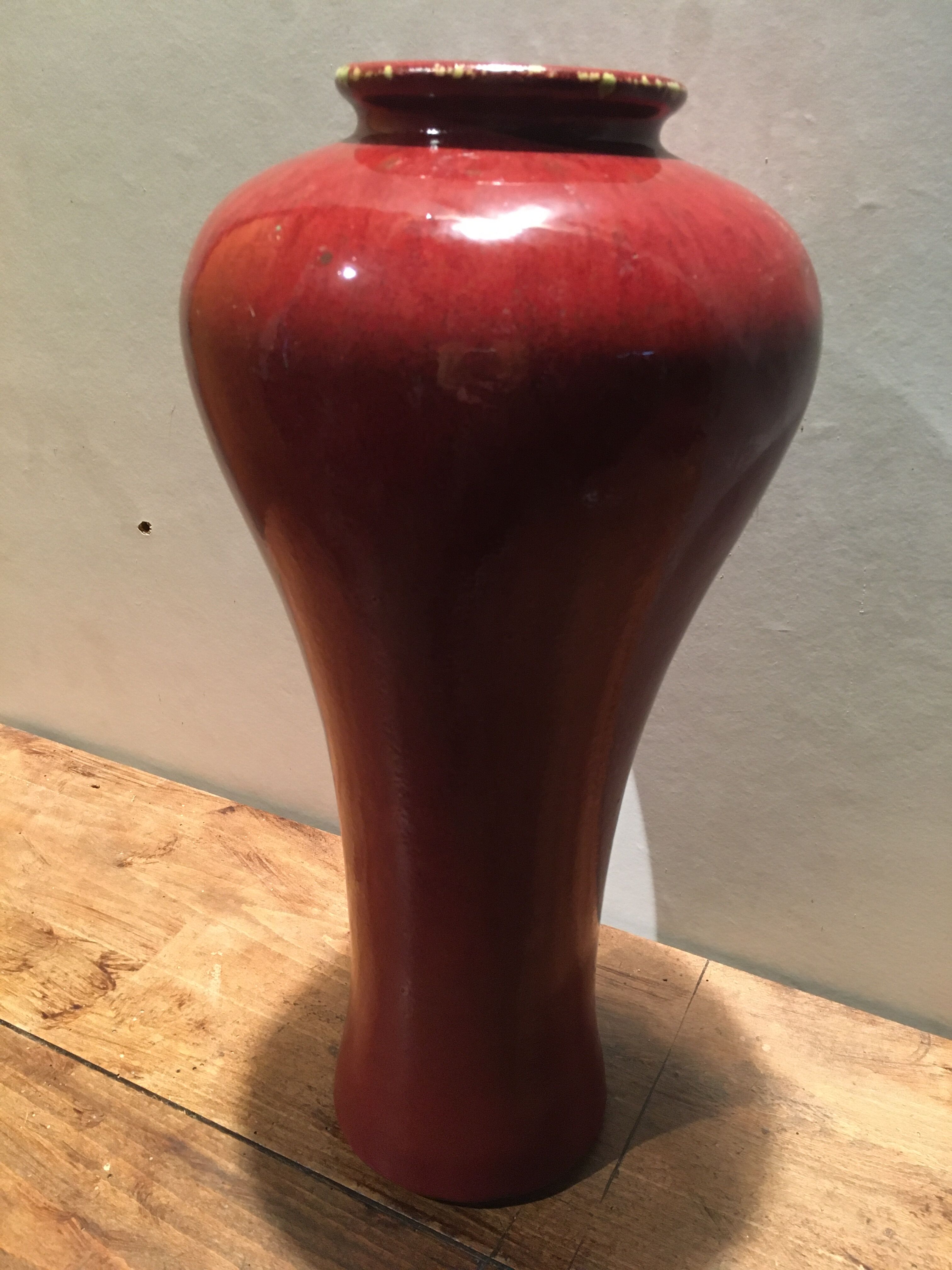 Red ceramic vase
