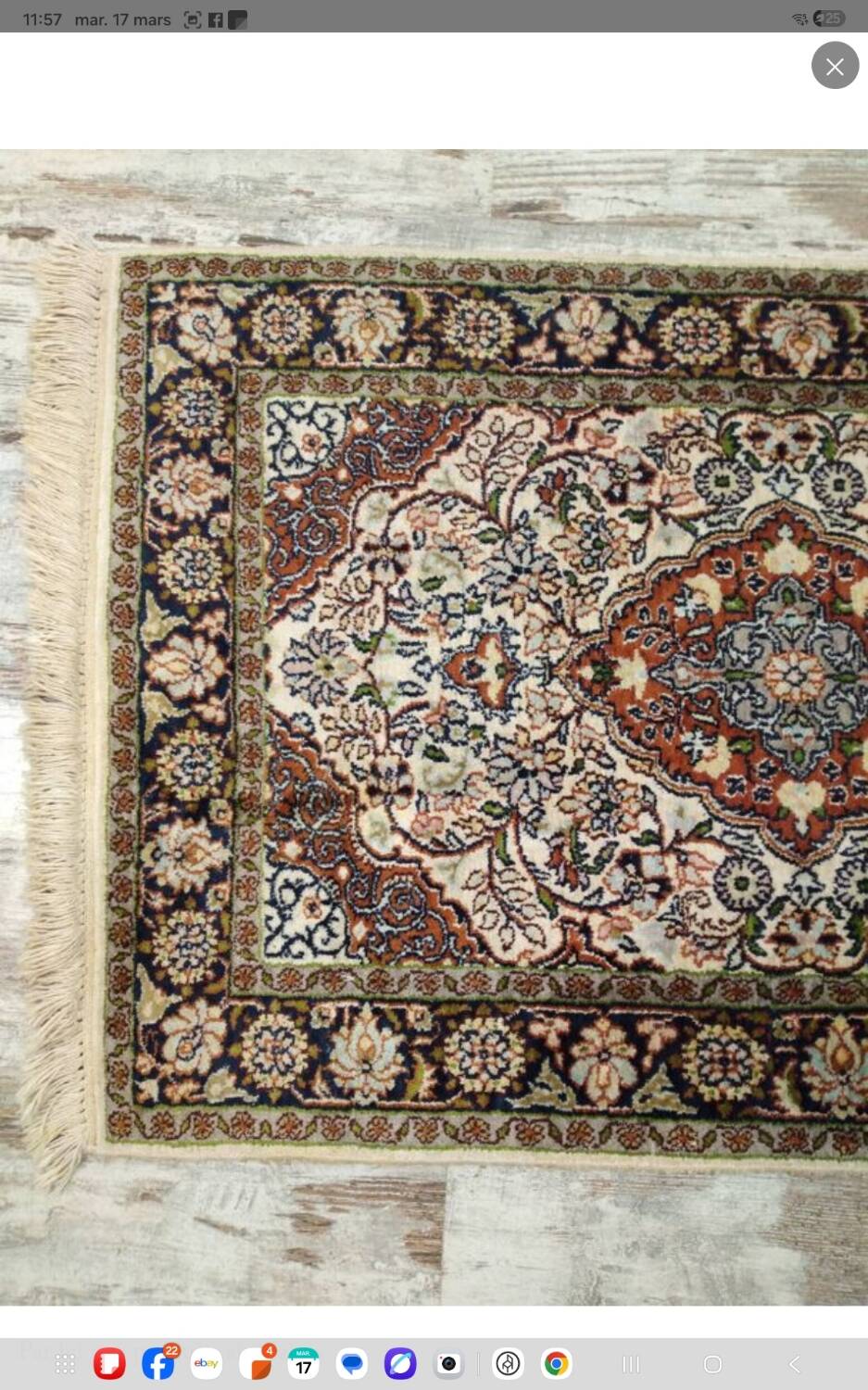 Handmade Persian carpet in wool and silk.