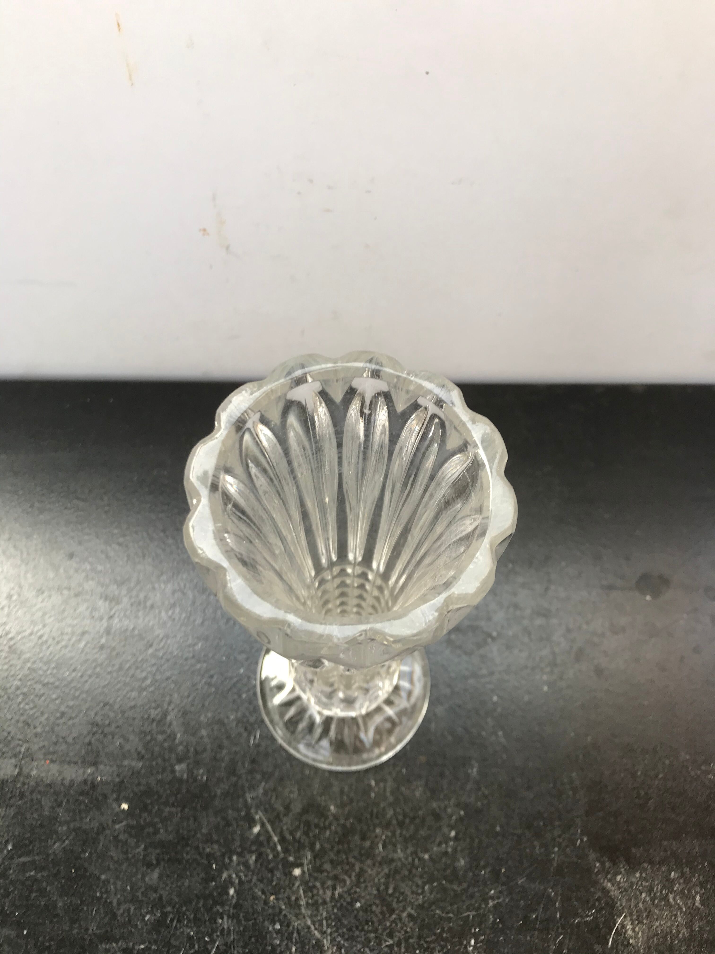 Old vase on foot vintage moulded glass