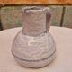 Old stamped glazed terracotta jug