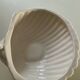 Vintage porcelain shell emptier