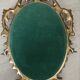 Petit miroir ovale signé Tallandier en laiton doré style Rococo – 30x2