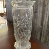 Transparent glass vase with relief floral decoration from the 1980s, fluted neck and polygonal base.