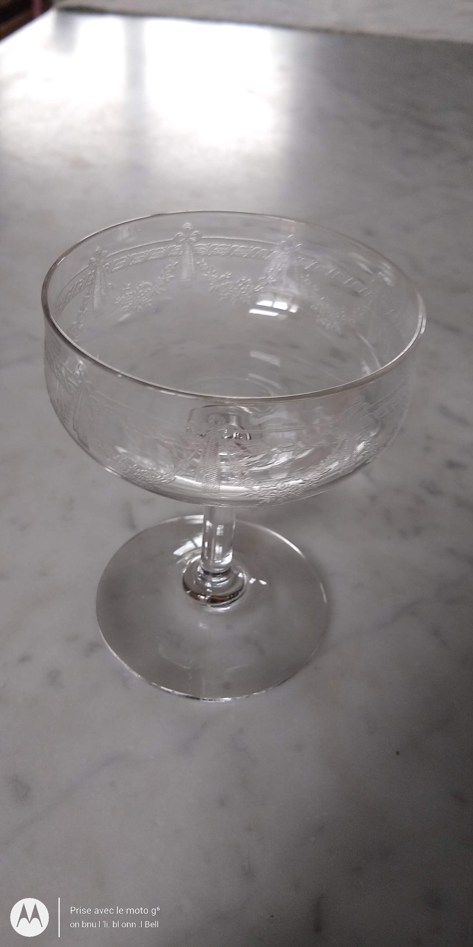 Louis XVI style engraved crystal champagne glass