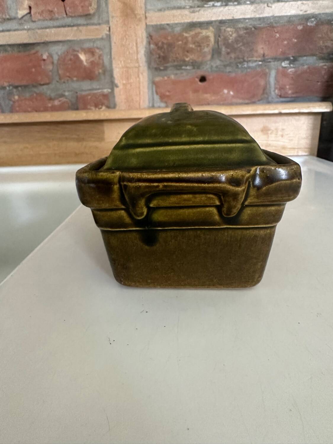 Vintage green majolica butter dish