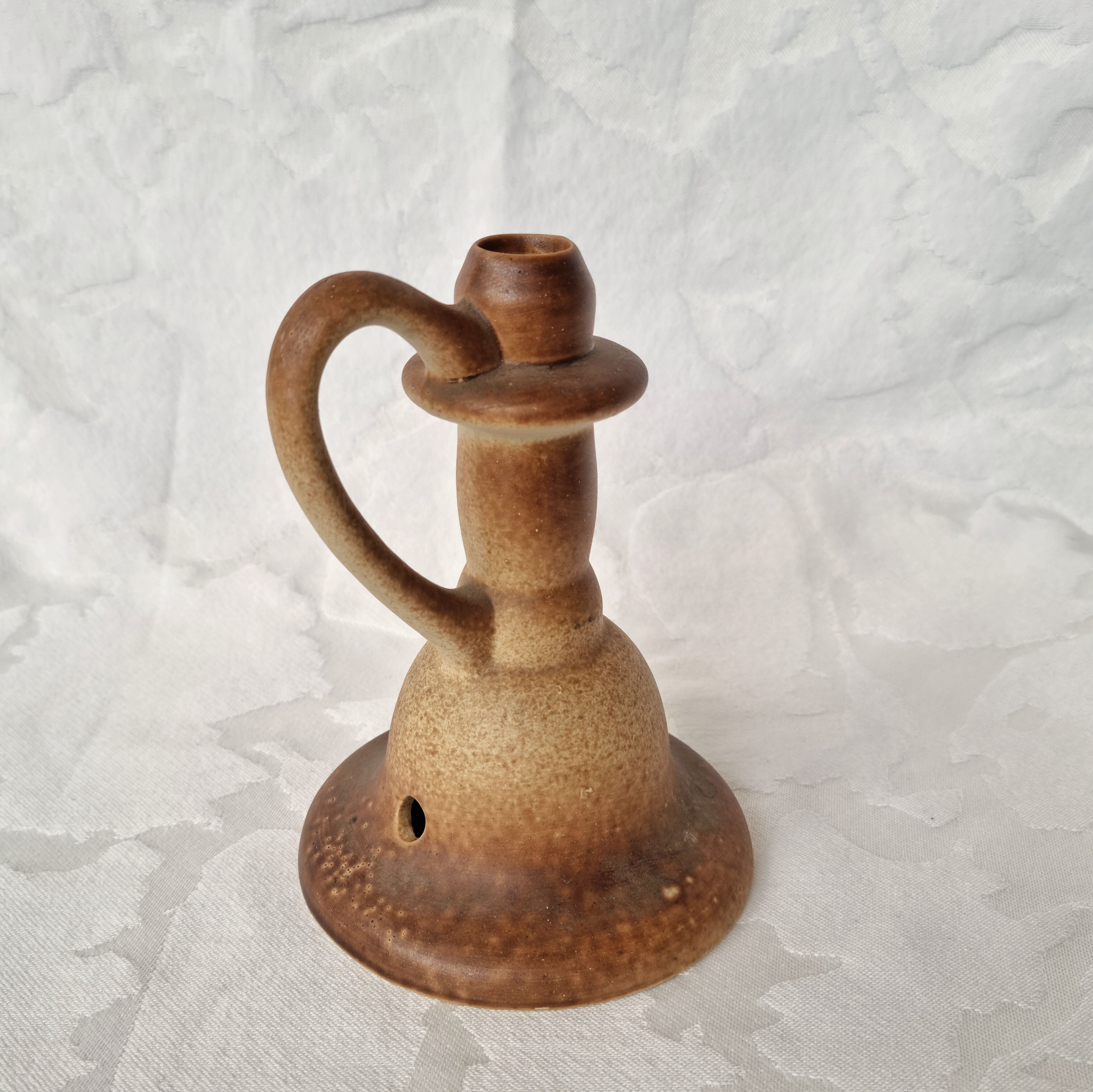 Candle holder or foot of a sandstone lamp