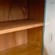 Rattan wardrobe with tapered legs from the 1960s.