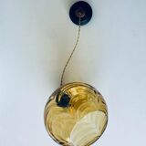 Amber glass ball suspension