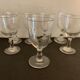 7 antique blown foot glasses
