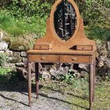 Dresser from the early 19th century with a cheval mirror.