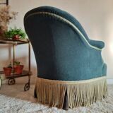 Green velvet toad armchair with fringes