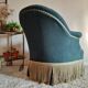 Fauteuil crapaud velours vert avec franges