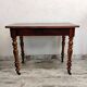 Antique wooden desk with a drawer.