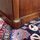 Empire bedside table from the 19th century in cherry wood and black marble.