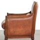 Sheepskin Art Deco design armchair with a comfortable seat and warm colours