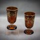 Pair of orange Bohemian glasses with monogram