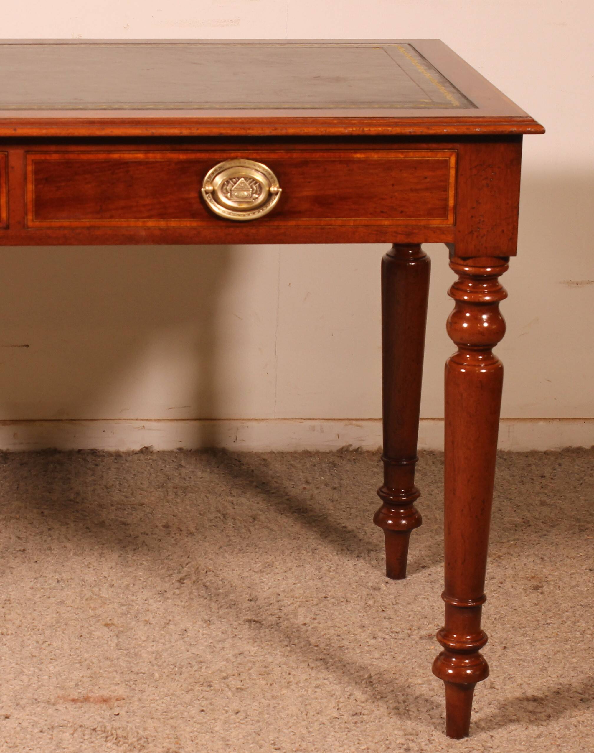 flat desk with two drawers from the 19th century in mahogany and inlays