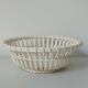 Woven earthenware basket