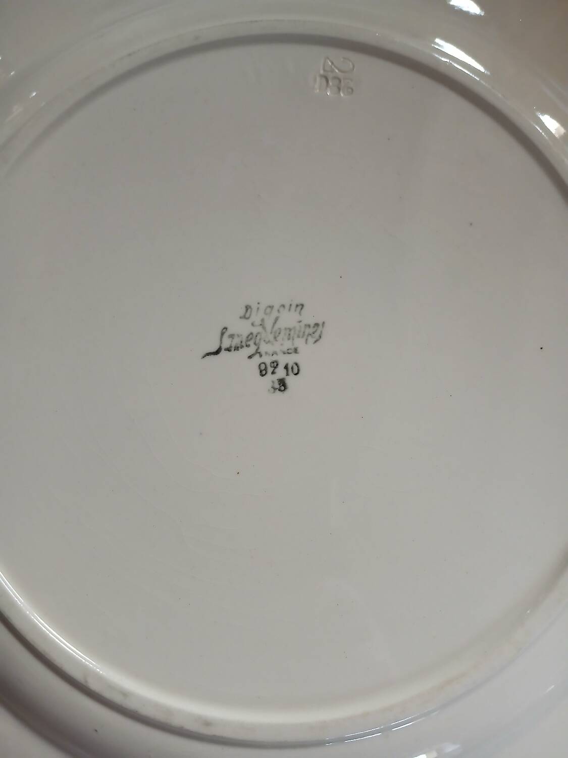 2 old plates from Digoin and Sarreguemines.