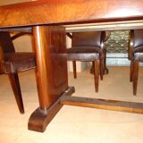 Modernist dining table in rosewood veneer.