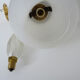 Old pair of wall sconces with carp, brass and globe in white opaline. Year 60