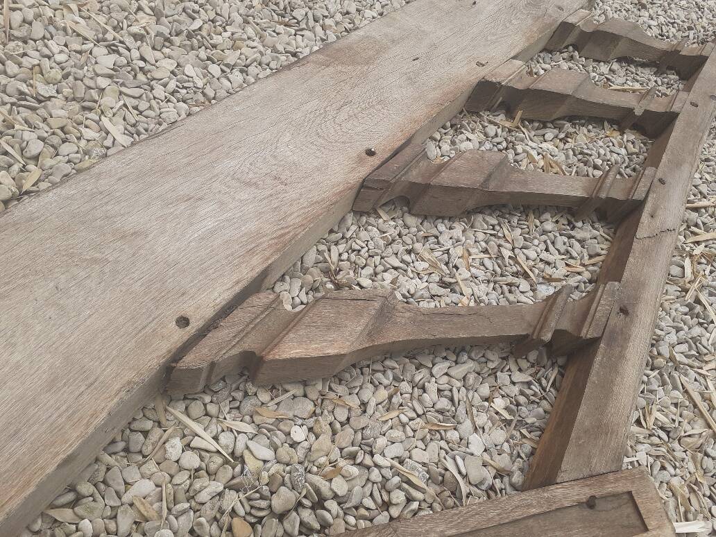 Old oak staircase balustrade with Louis XIII scrolled balusters