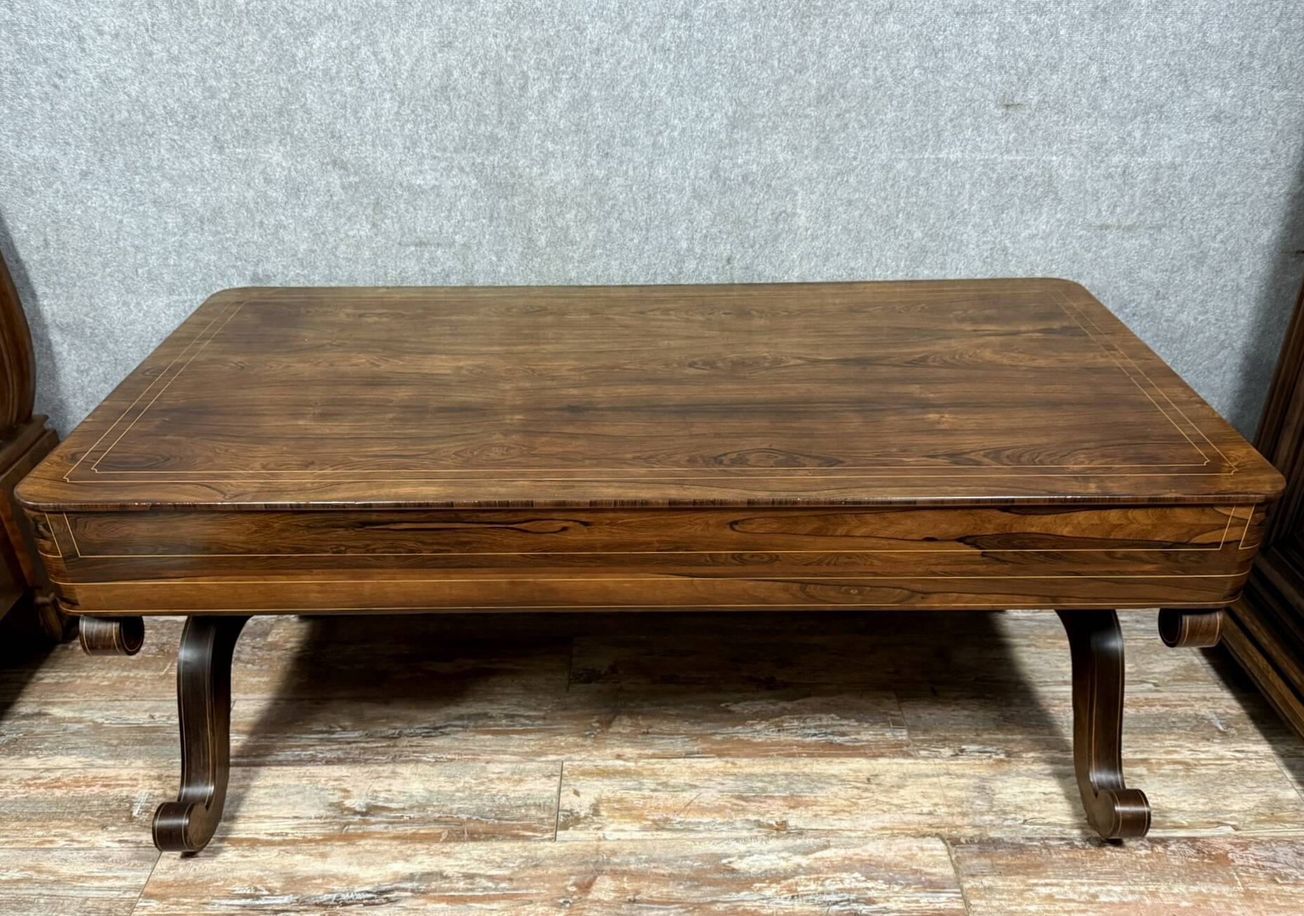 Very large Charles X period center desk in rosewood and lemonwood