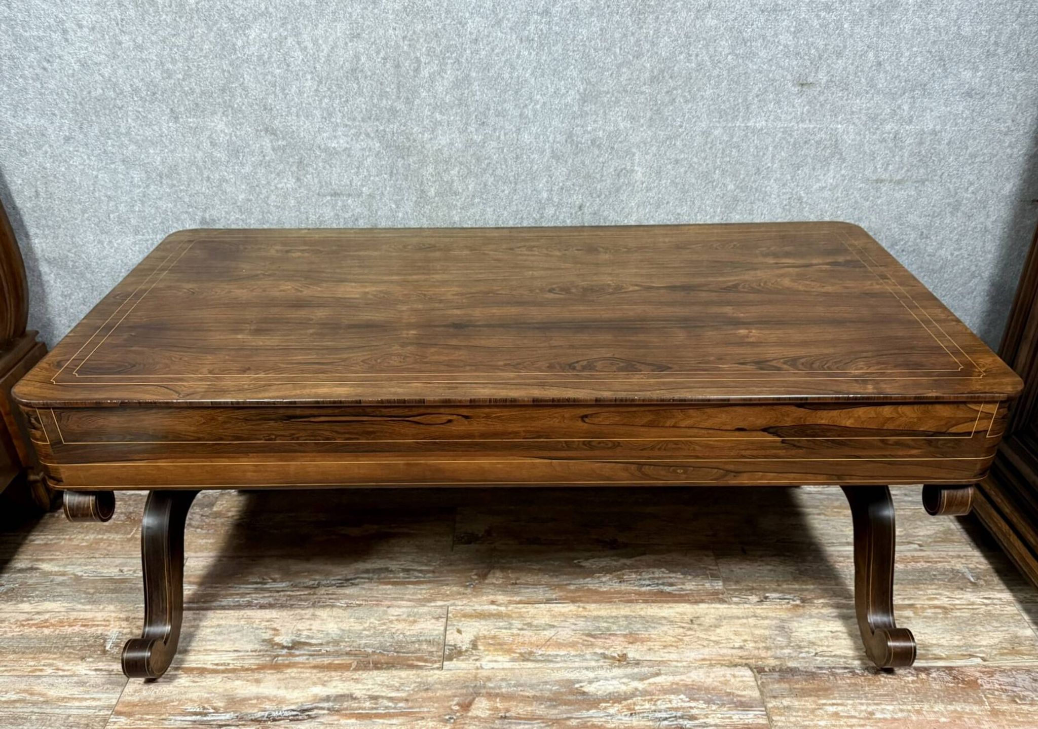 Very large Charles X period center desk in rosewood and lemonwood