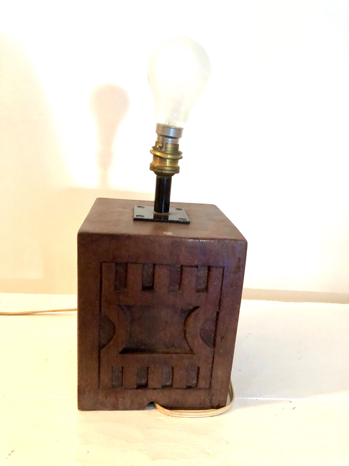 Brutalist folk art lamp base in teak from the 40s/50s.
