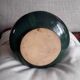 Vintage ceramic vase with a very original design.