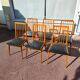 Set of 6 Scandinavian wooden and vintage leatherette chairs