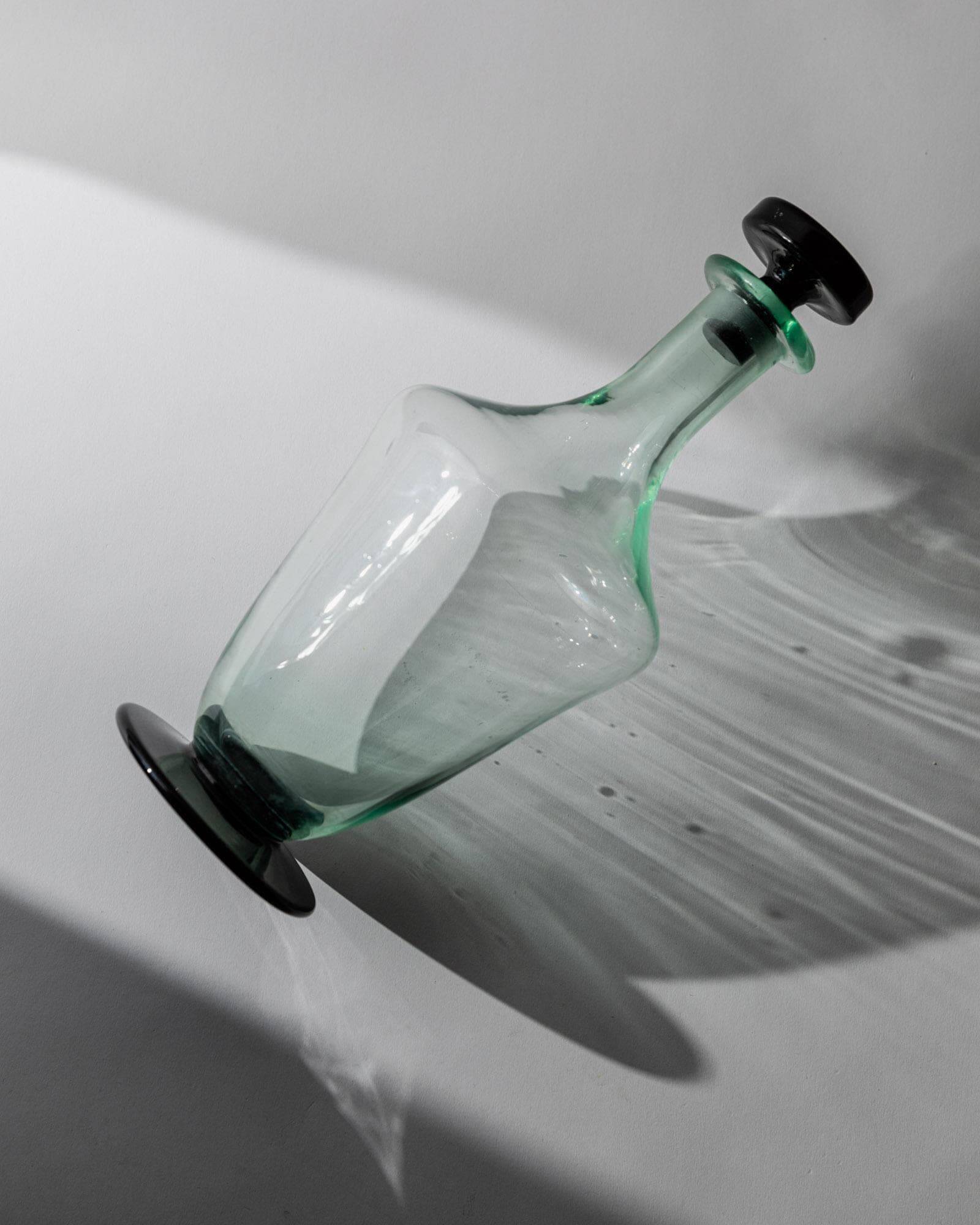 Vintage Murano glass carafe from the 1960s, green and black, with a stopper.