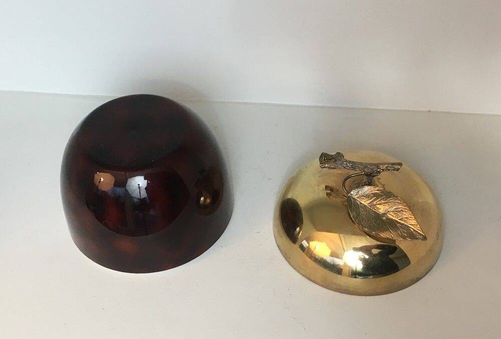 Apple-shaped ice bucket in red celluloid, gold-tone metal and plastic