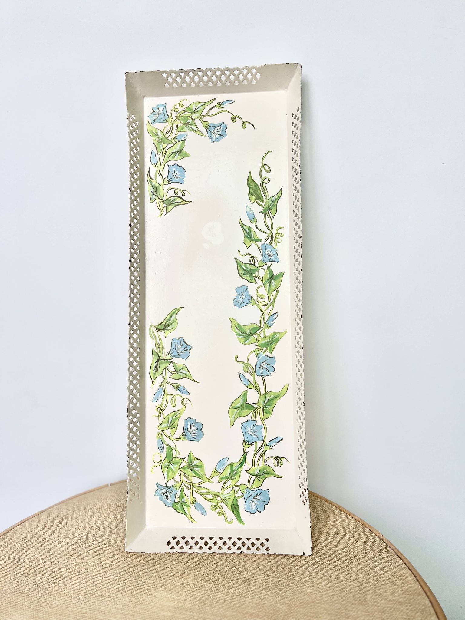 Large painted sheet metal tray with flower decoration
