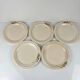 Set de 5 assiettes à dessert Longwy, début XXème siècle, décor floral