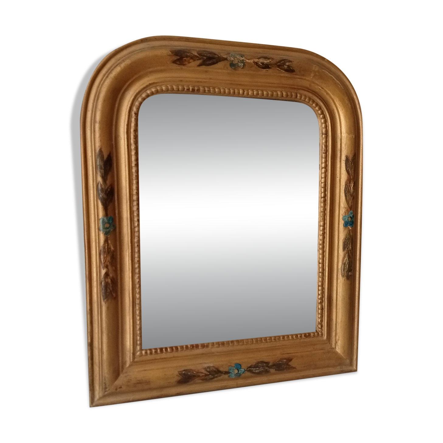 Antique Louis Philippe mirror in gilded solid wood.