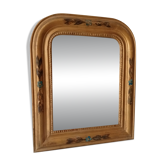 Antique Louis Philippe mirror in gilded solid wood.