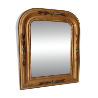 Antique Louis Philippe mirror in gilded solid wood.