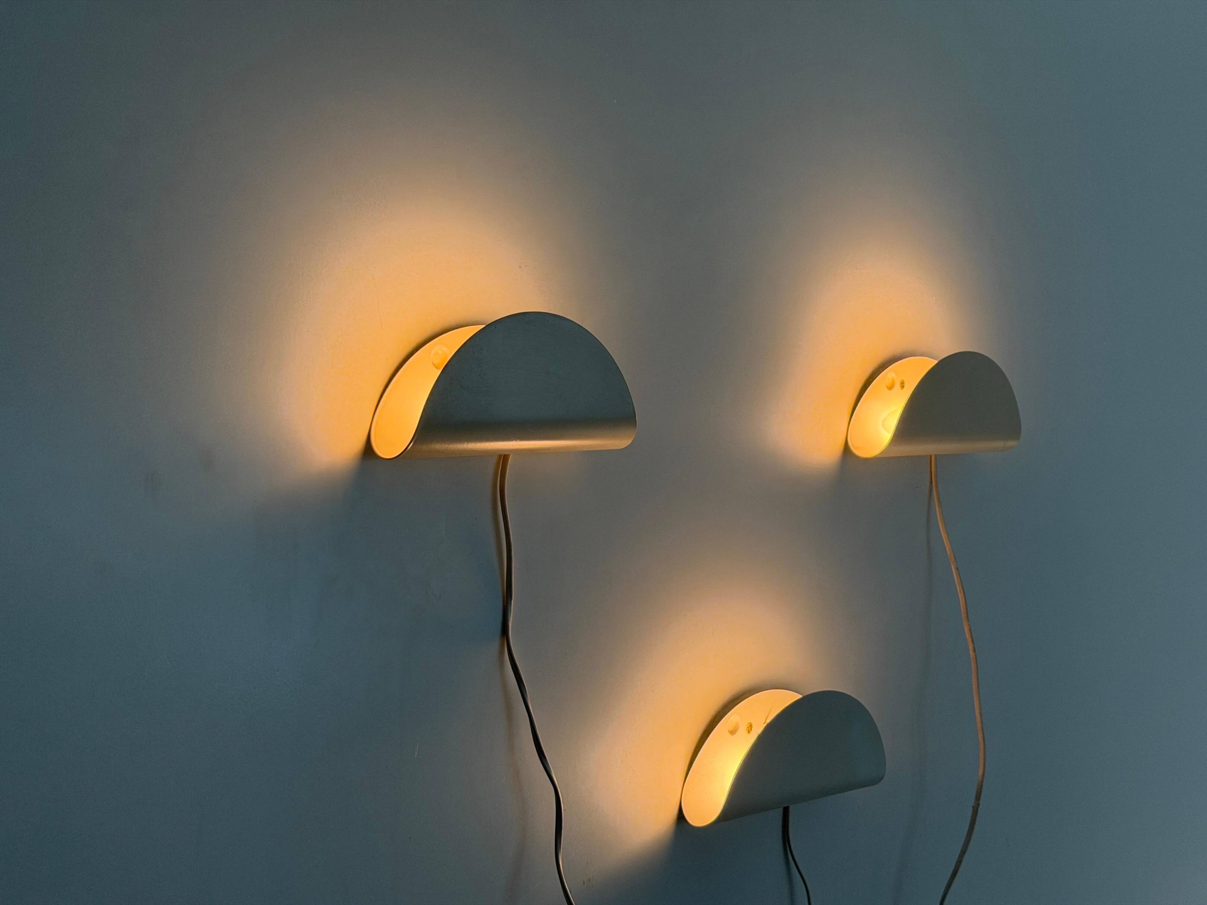 Set of three cream metal wall lights by Nordlux, 1980s, Sweden.