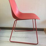 Red muuto "visu" chairs with sled base