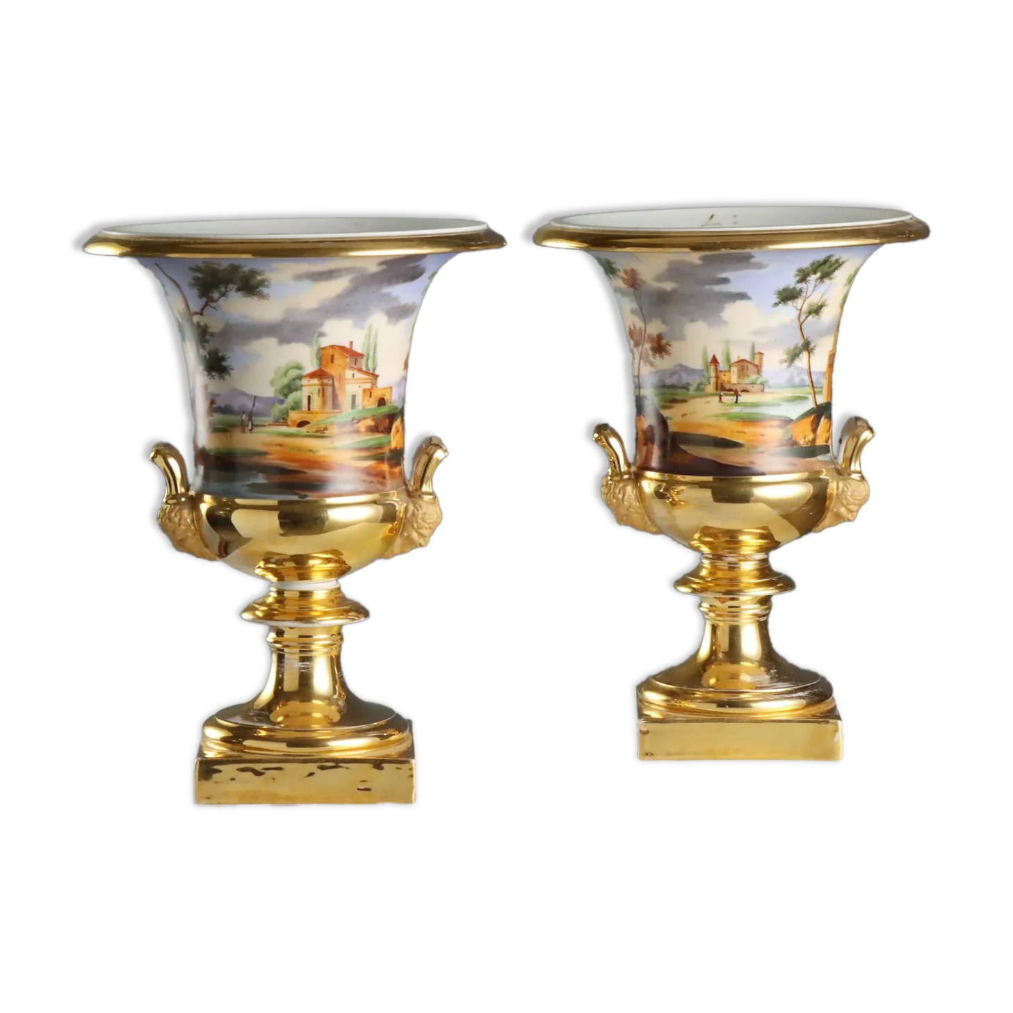 Pair of antique painted and decorated porcelain vases, France, 19th century.